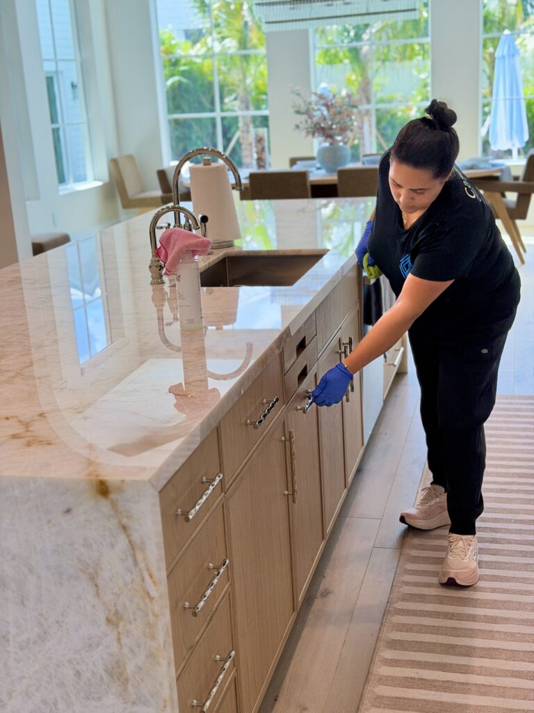 crew member cleaning kitchen in Boca Raton