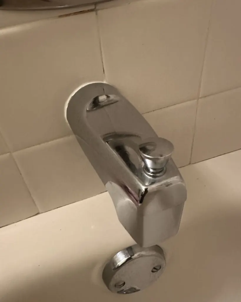 After: tub spout cleaned by Casabela