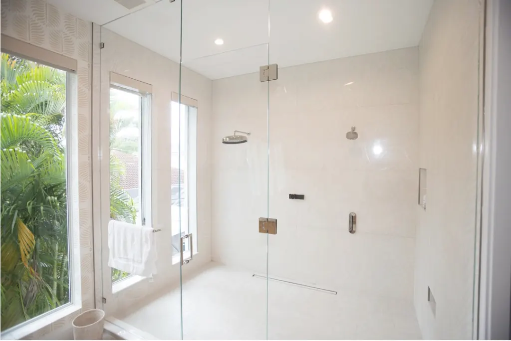 Sparkling glass shower in a client home