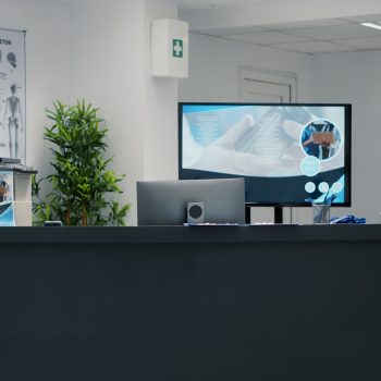 Empty reception desk for appointments at medical facility